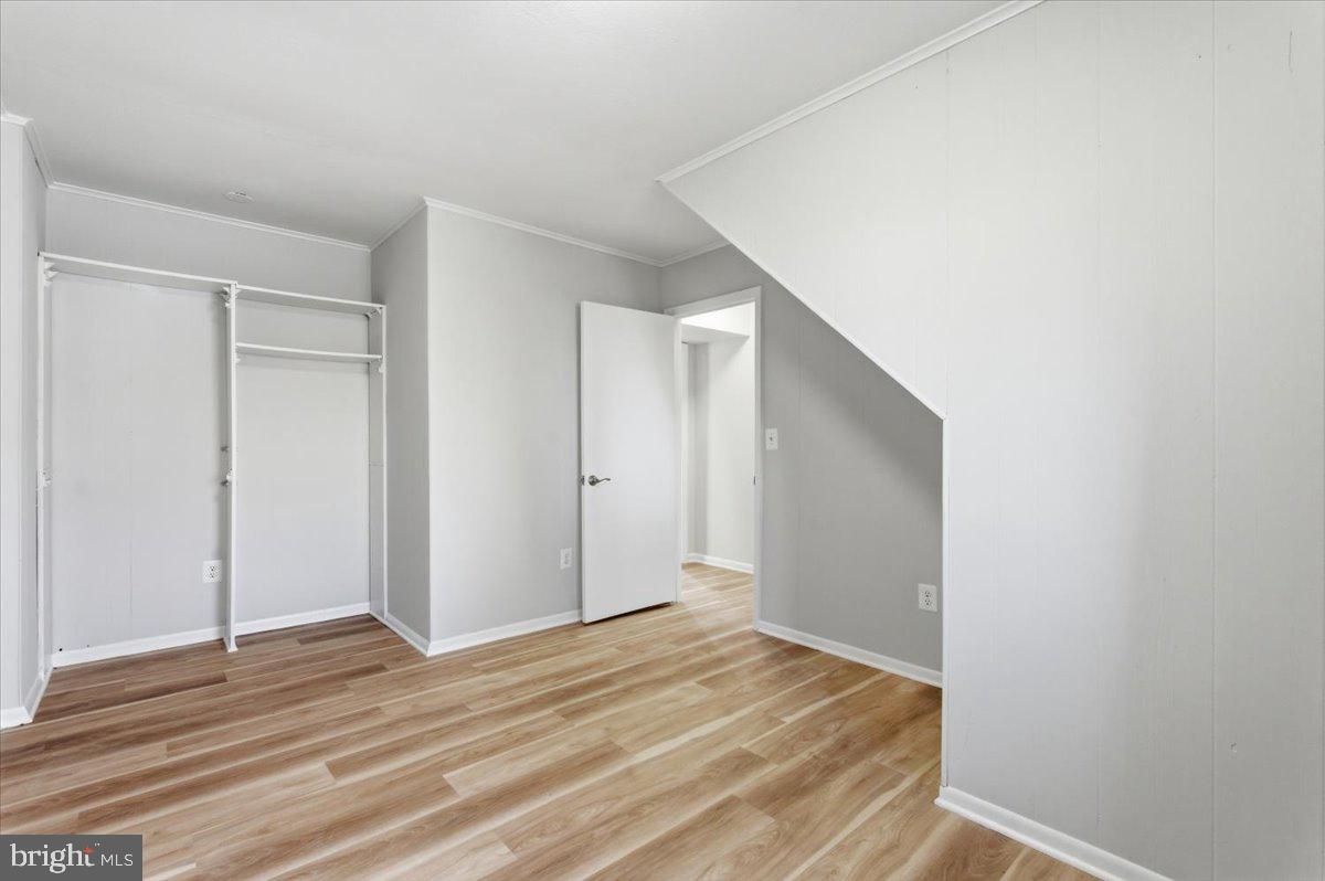 11919 Barrel Cooper Court Reston, VA 20191 - Photo 31 of 39 a view of a room with wooden floor