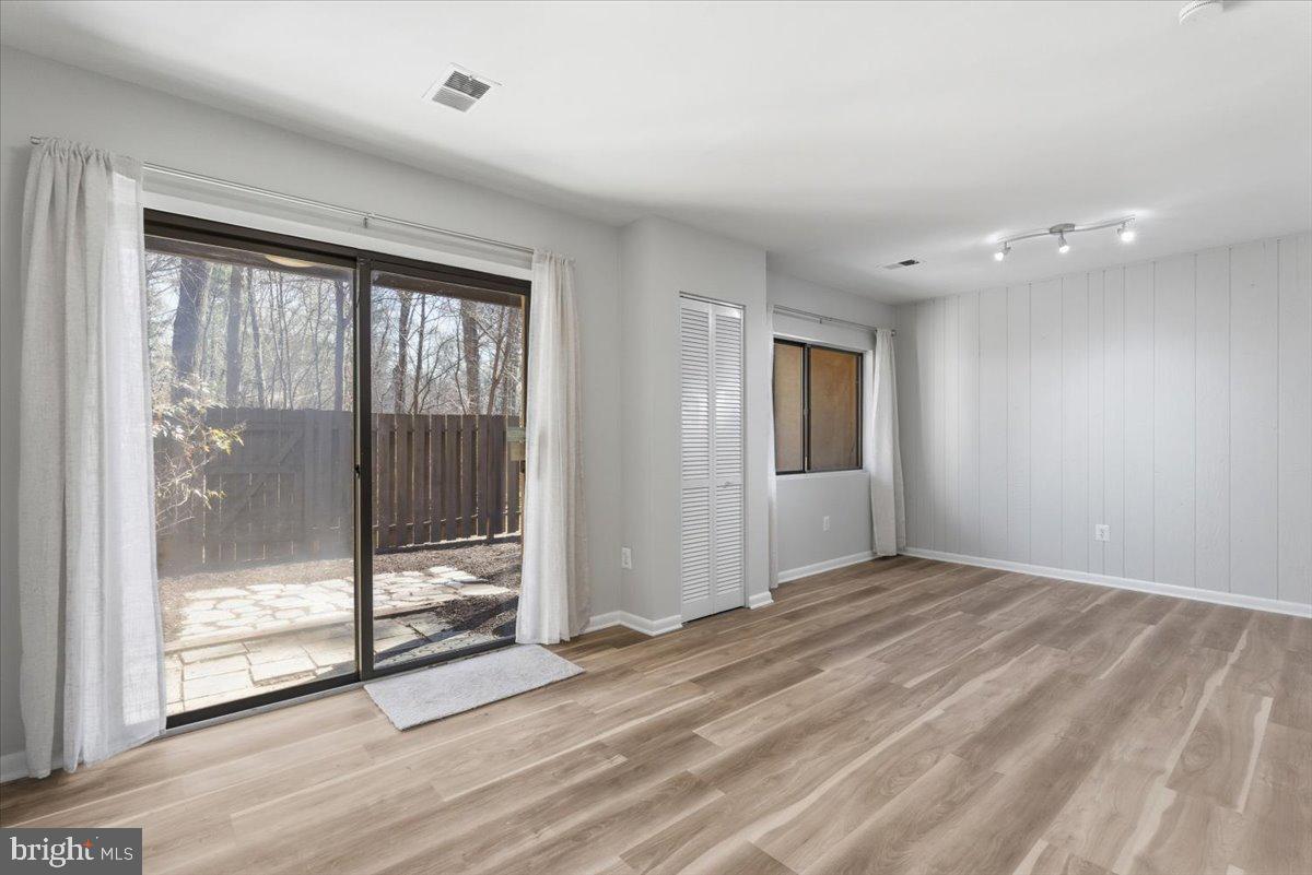 11919 Barrel Cooper Court Reston, VA 20191 - Photo 35 of 39 a view of an empty room with glass door