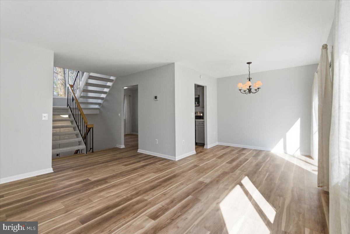 11919 Barrel Cooper Court Reston, VA 20191 - Photo 4 of 39 a view of empty room with stairs and ventilation