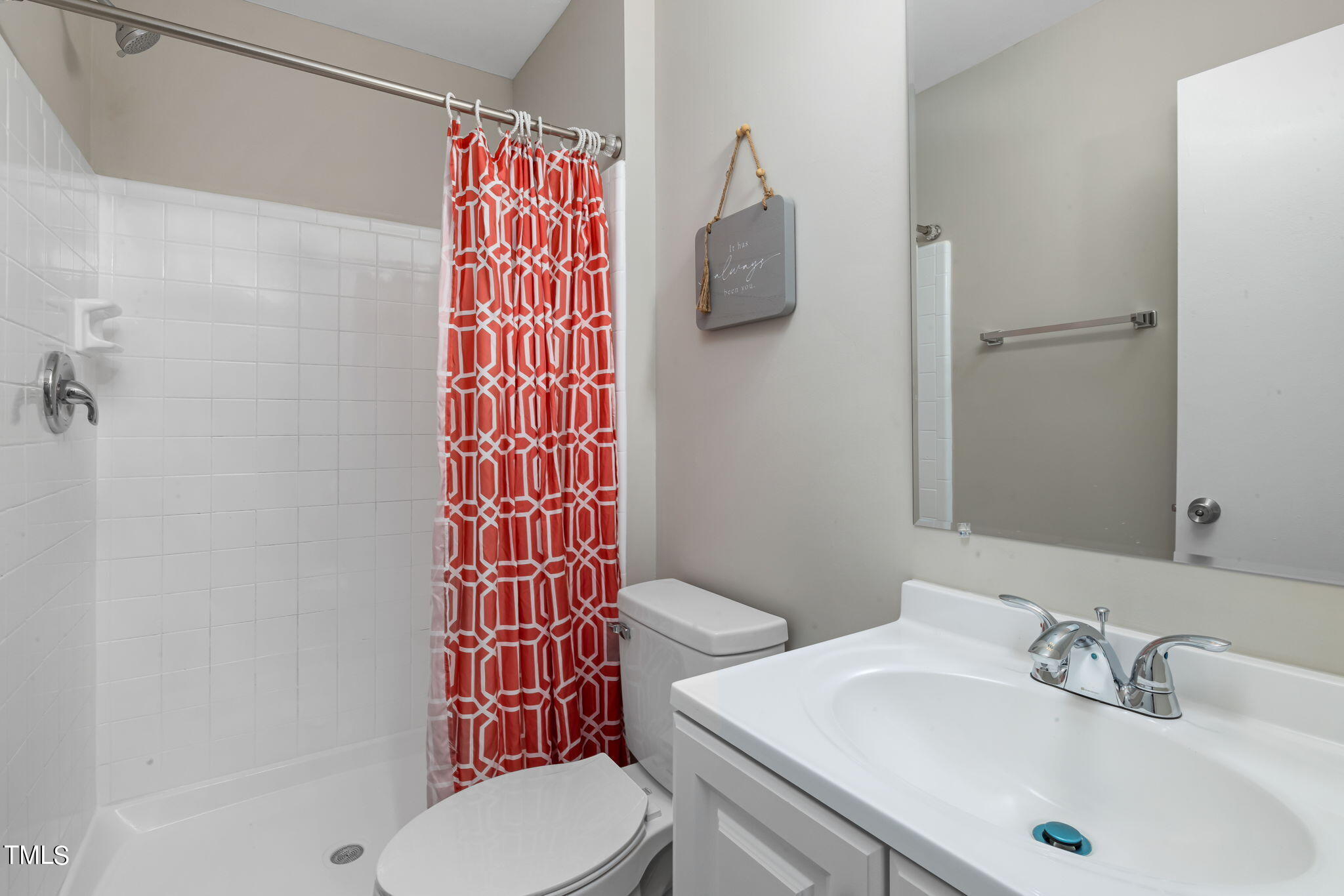 1728 Quail Ridge Road Raleigh, NC 27609 - Photo 25 of 38 a bathroom with a sink and a toilet