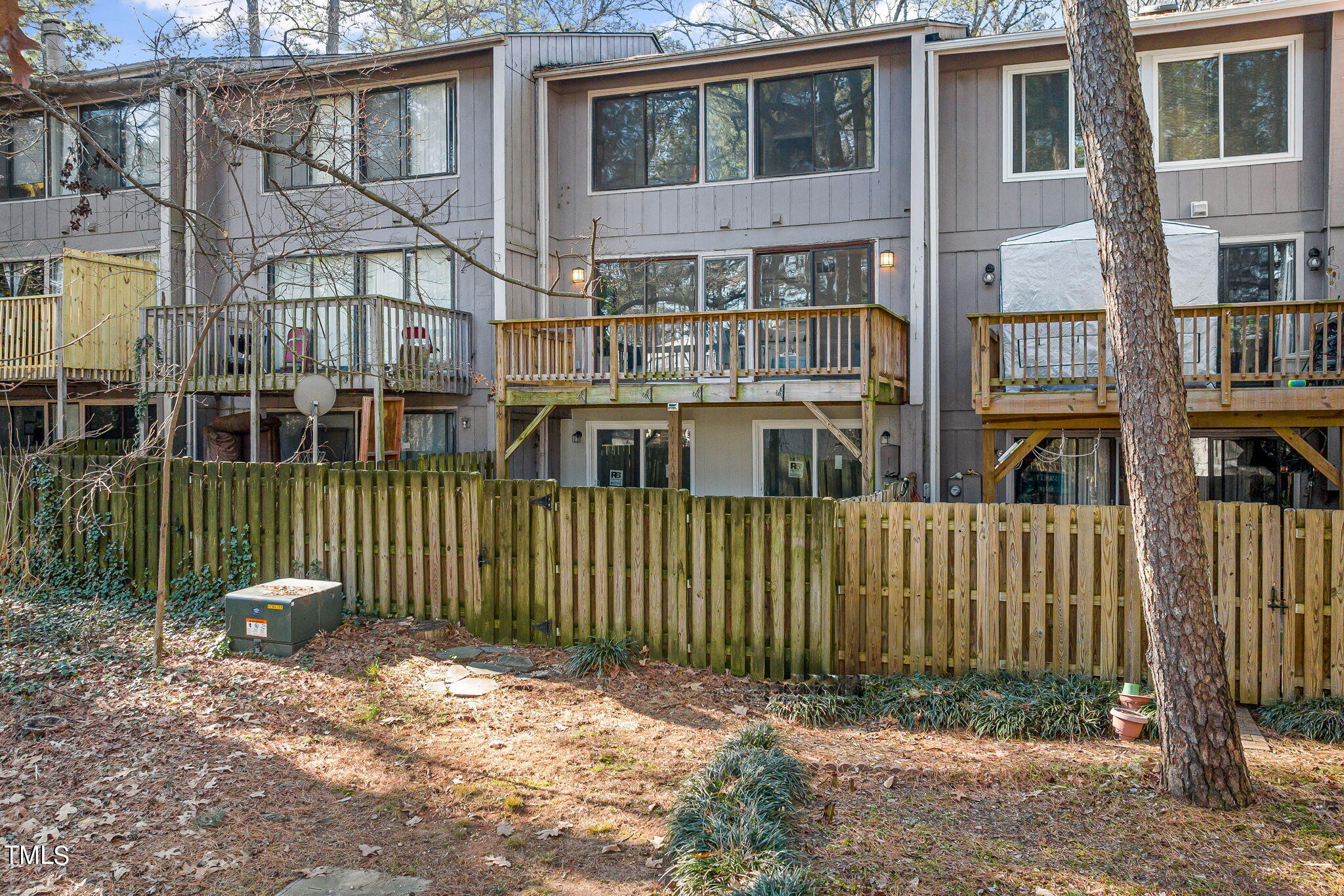 1728 Quail Ridge Road Raleigh, NC 27609 - Photo 38 of 38 a front view of a house with a garden