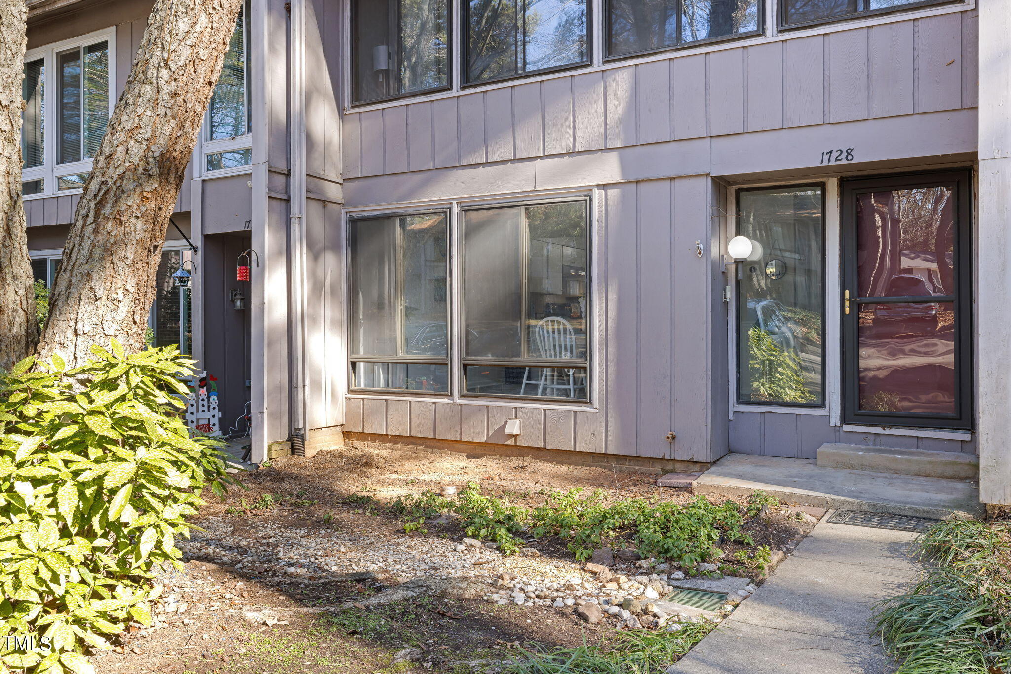 1728 Quail Ridge Road Raleigh, NC 27609 - Photo 4 of 38 a view of a entrance of the house