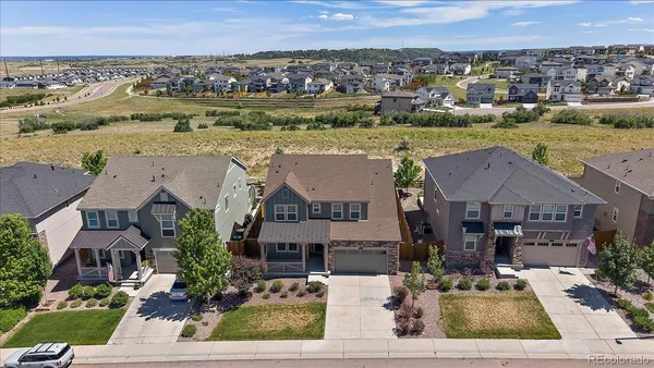 an aerial view of a house with a outdoor space