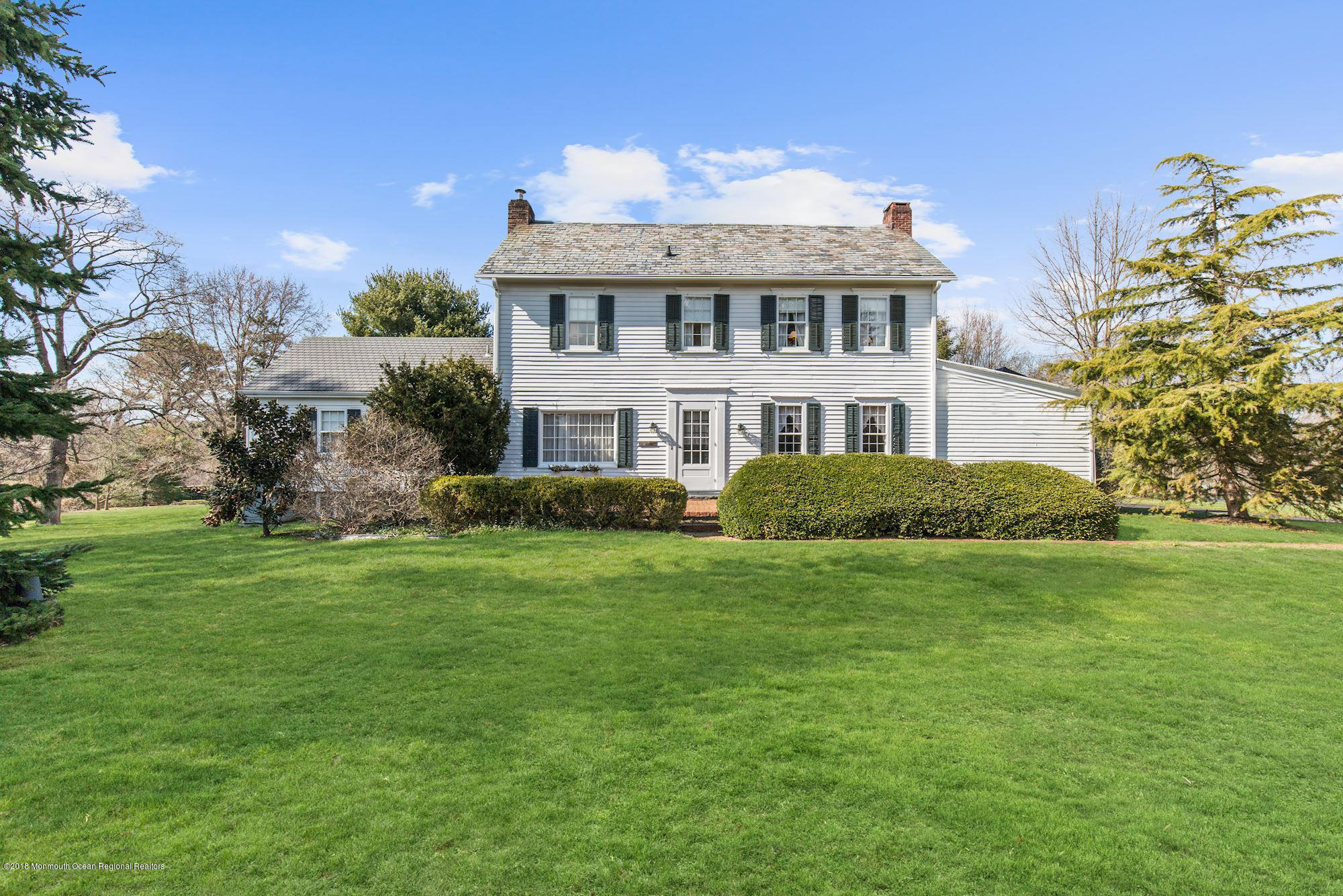 19 Tilton Road Middletown, NJ 07748 - Photo 1 of 26 a front view of a house with a garden