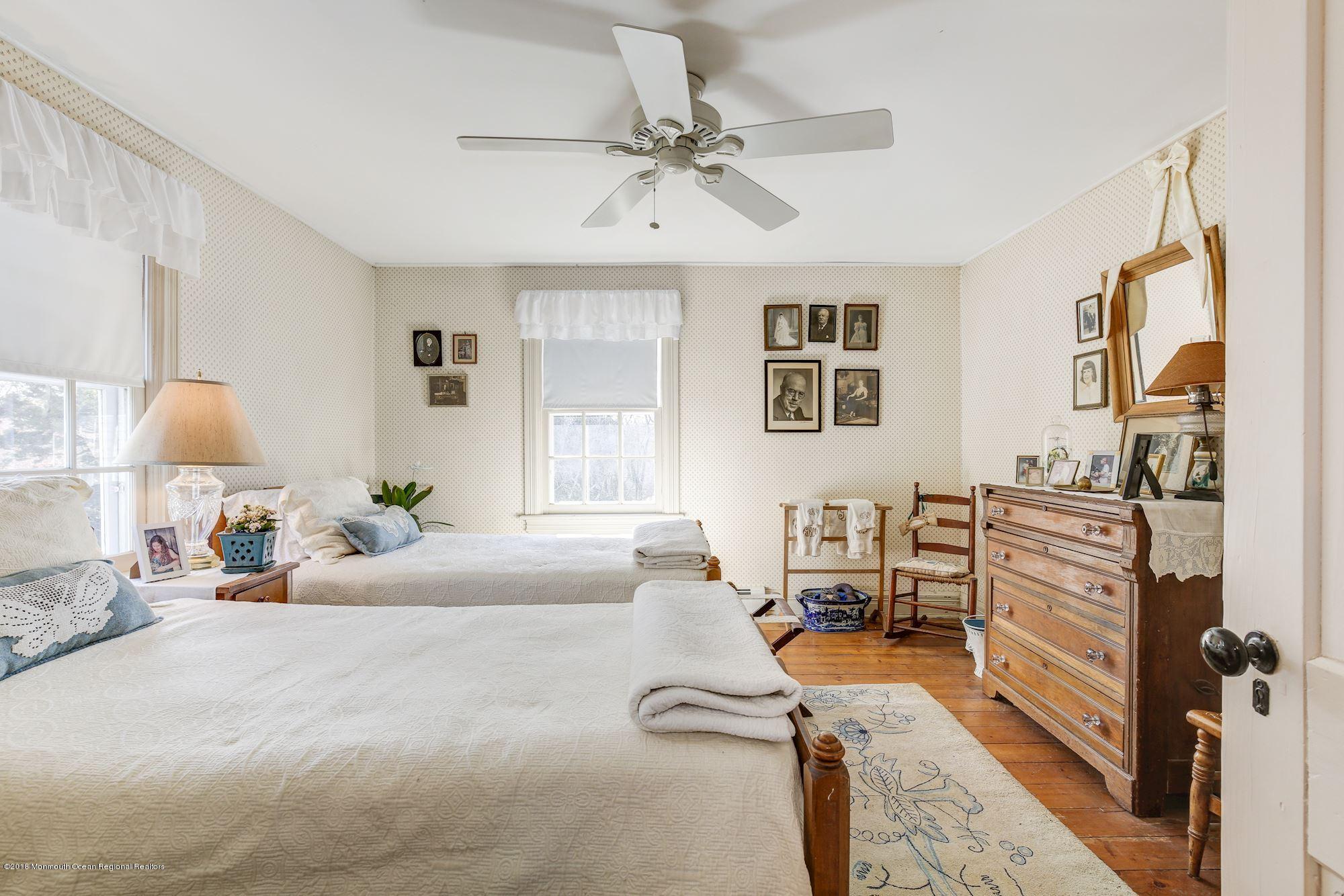 19 Tilton Road Middletown, NJ 07748 - Photo 21 of 26 a bedroom with furniture and a window