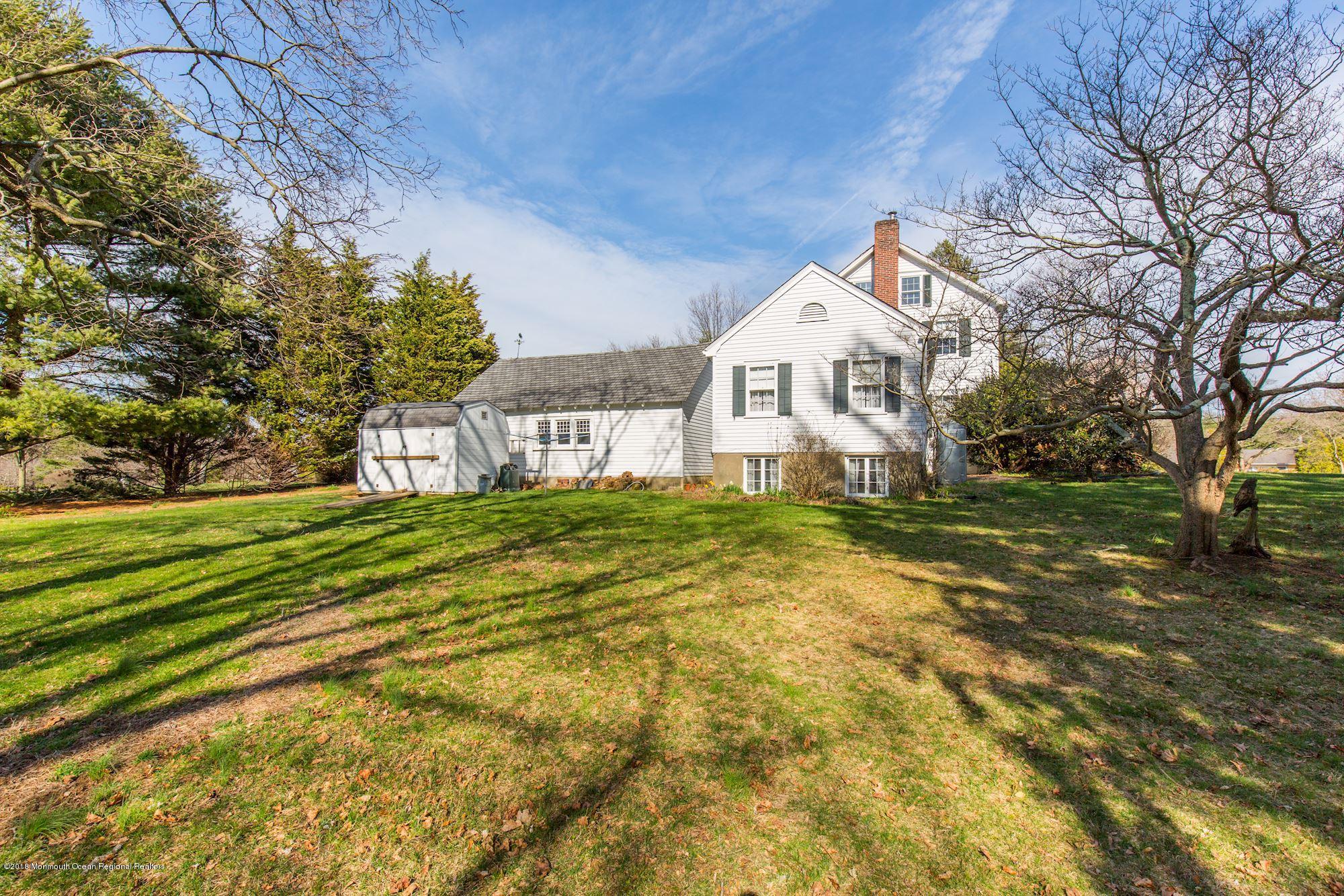 19 Tilton Road Middletown, NJ 07748 - Photo 24 of 26 a view of a house with a big yard