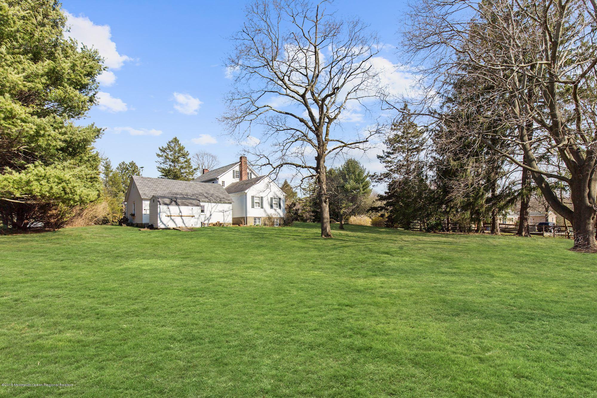 19 Tilton Road Middletown, NJ 07748 - Photo 25 of 26 a view of a trees front of a house