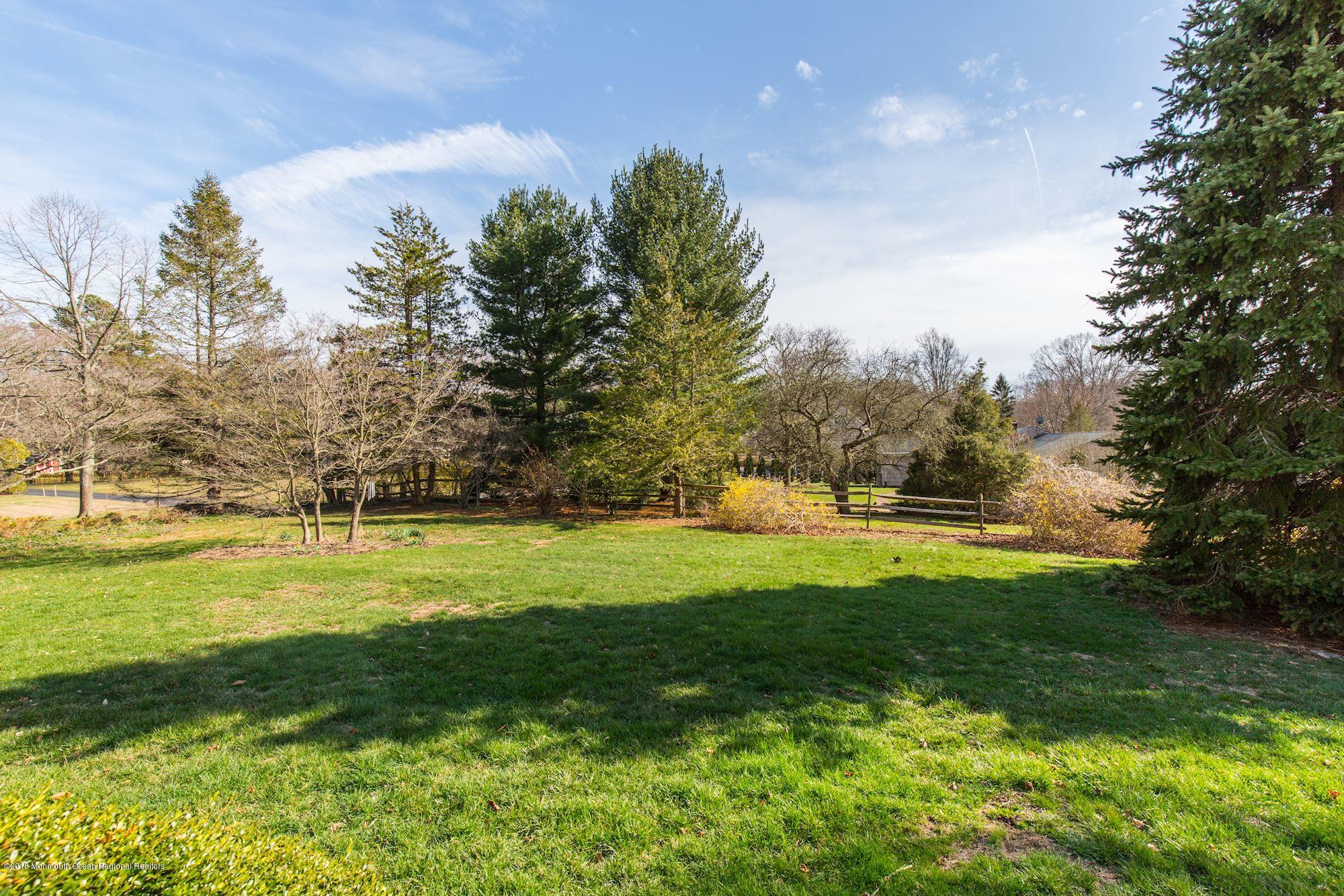 19 Tilton Road Middletown, NJ 07748 - Photo 26 of 26 a view of a golf course with a lake