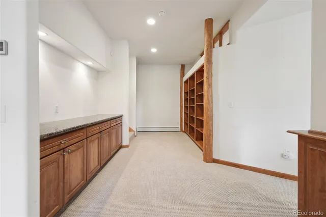 a view of hallway with stairs