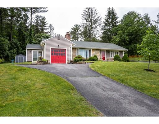 60 Palmer Road Monson, MA 01057 - Photo 3 of 40 a front view of a house with a yard and trees