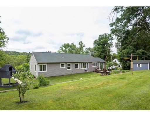 60 Palmer Road Monson, MA 01057 - Photo 8 of 40 a view of a house with a big yard and large trees