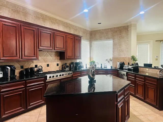 a view of storage and utility room with wooden floor