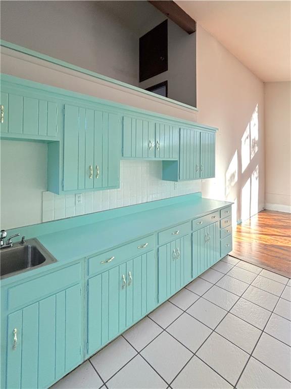 1568 Pulaski Mercer Road Mercer, PA 16137 - Photo 11 of 18 a kitchen with cabinets a sink and a stove