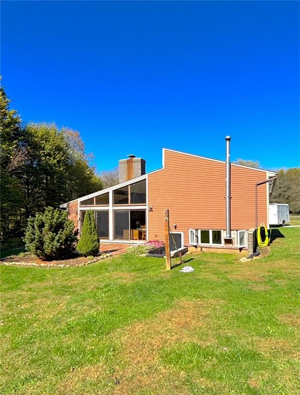 1568 Pulaski Mercer Road Mercer, PA 16137 - Photo 2 of 18 a view of a house with a big yard
