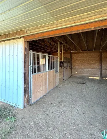 a view of a room with wooden walls