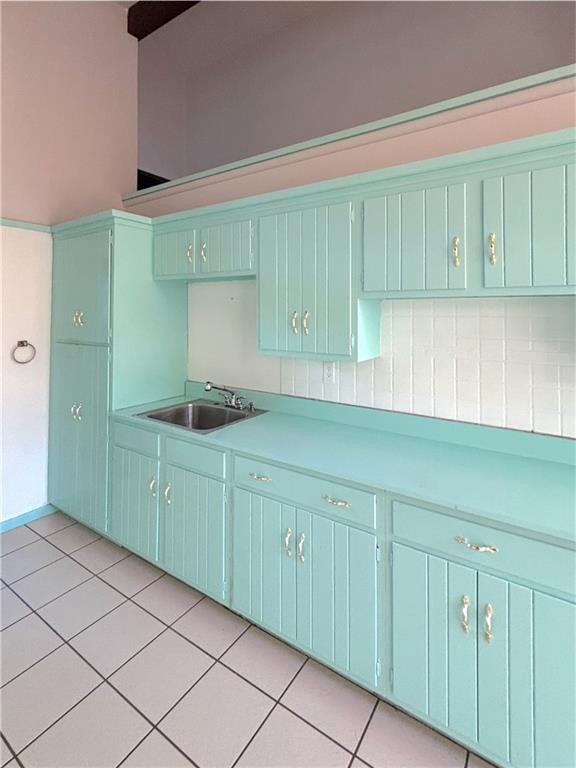 1568 Pulaski Mercer Road Mercer, PA 16137 - Photo 10 of 18 a kitchen with cabinets a washer and dryer