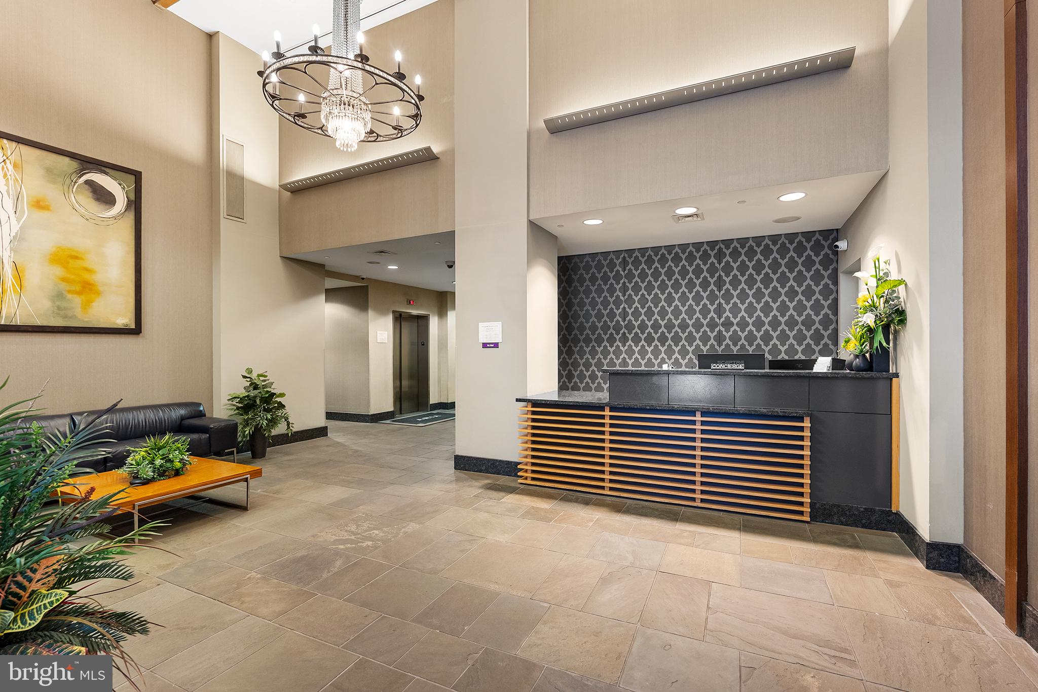 1425 Locust Street, Unit 26B Philadelphia, PA 19102 - Photo 28 of 39 Lobby & Concierge Desk