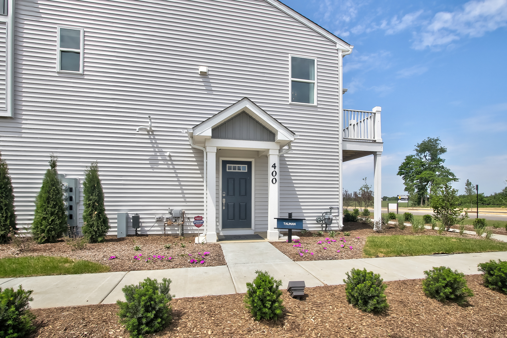 486 Comstock Road South Elgin, IL 60177 - Photo 3 of 33 a front view of a house with a yard and outdoor seating