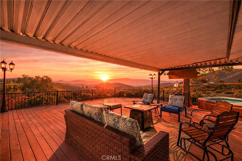 24401 Cornstalk Road Wildomar, CA 92595 - Photo 1 of 1 a view of a balcony with chairs