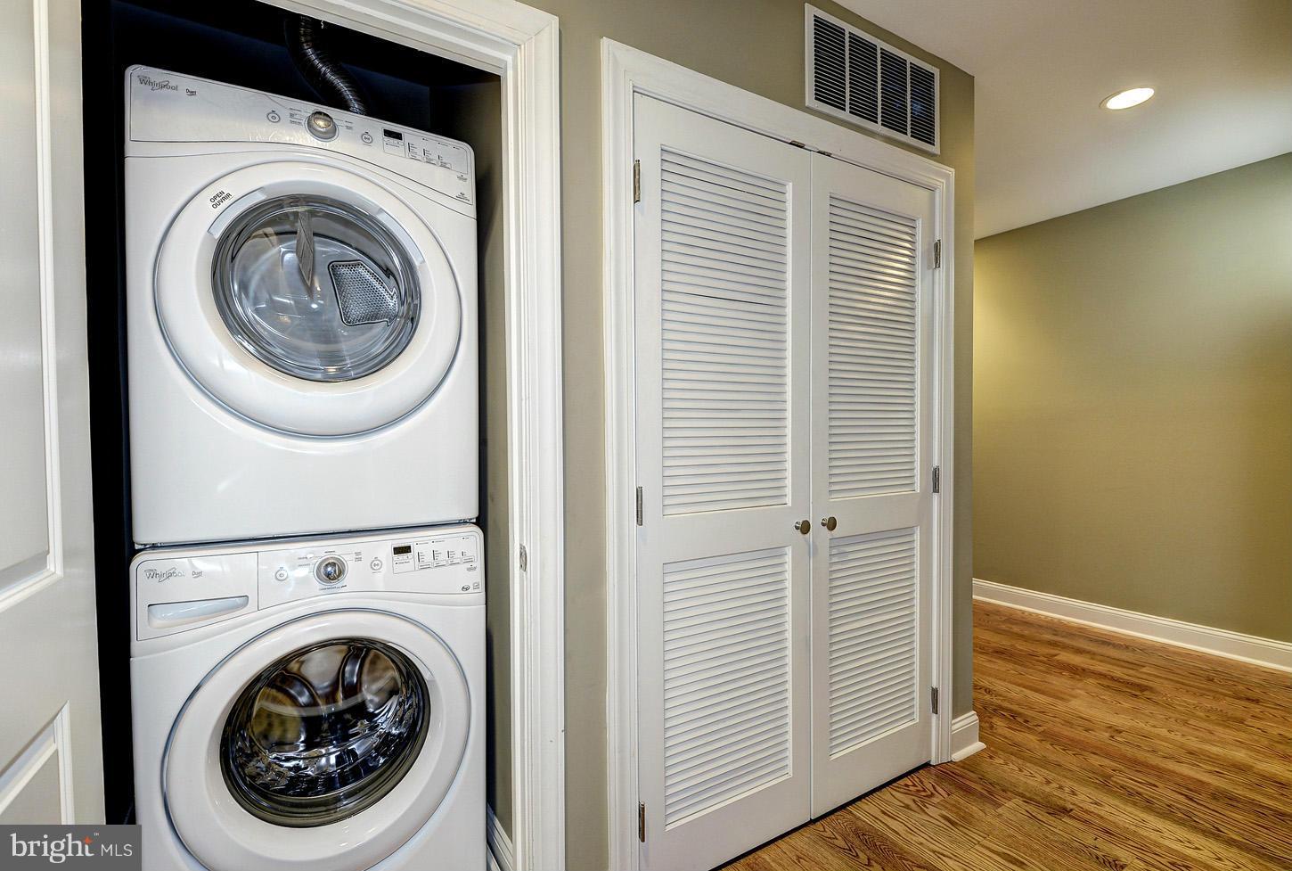 1925 North Capitol Street Northeast, Unit 2 Washington, DC 20002 - Photo 15 of 22 a view of a hallway with washer and dryer