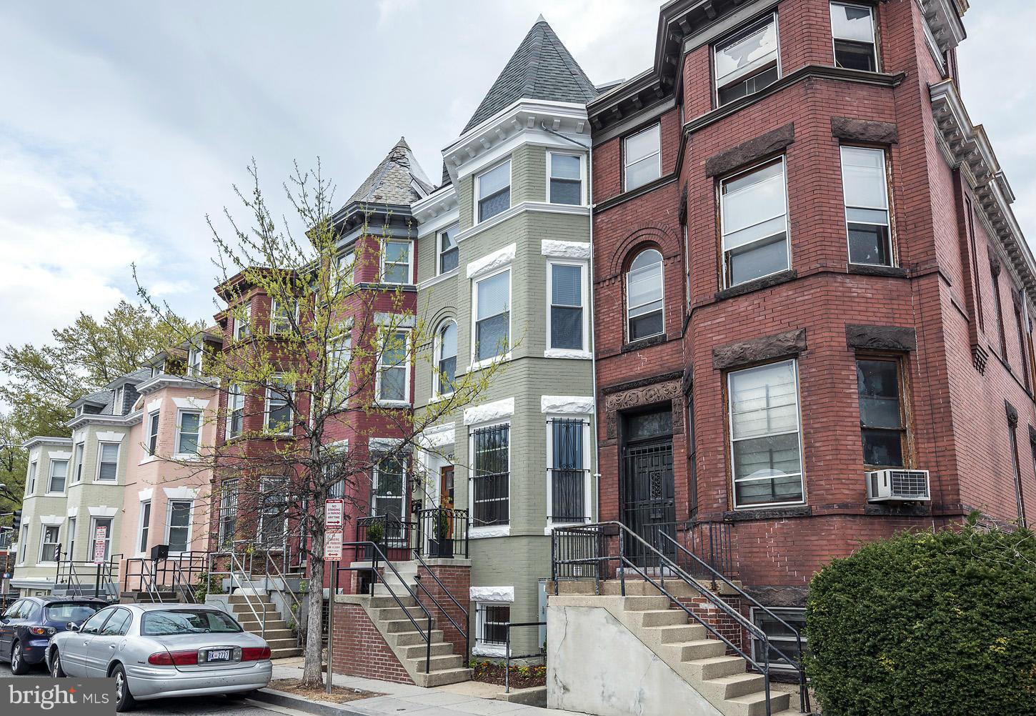 1925 North Capitol Street Northeast, Unit 2 Washington, DC 20002 - Photo 21 of 22 a front view of a residential apartment building with a yard