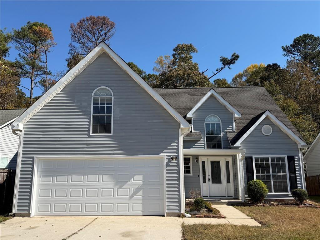 6770 Biscayne Rex, GA 30273 - Photo 1 of 24 a view of a house with a yard