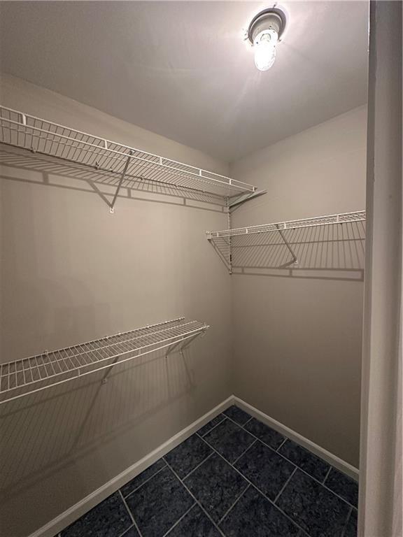 6770 Biscayne Rex, GA 30273 - Photo 15 of 24 a view of a room with racks on the wall