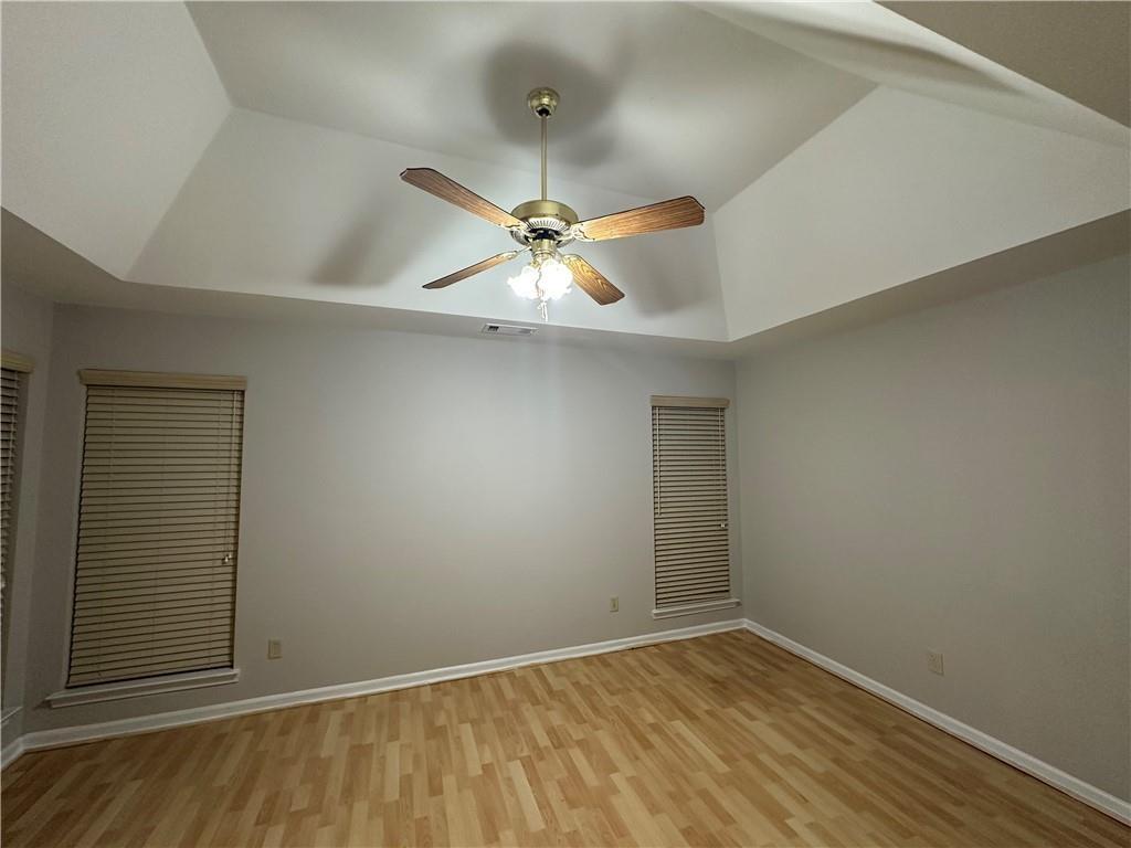 6770 Biscayne Rex, GA 30273 - Photo 23 of 24 an empty room with a ceiling fan and window