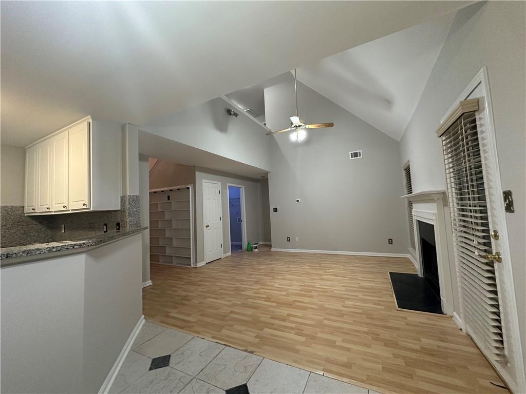 6770 Biscayne Rex, GA 30273 - Photo 5 of 24 a view of a kitchen with a sink and a stove top oven