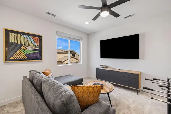 an aerial view of residential houses with outdoor space