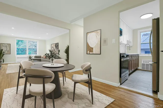 a view of a livingroom with furniture and a table