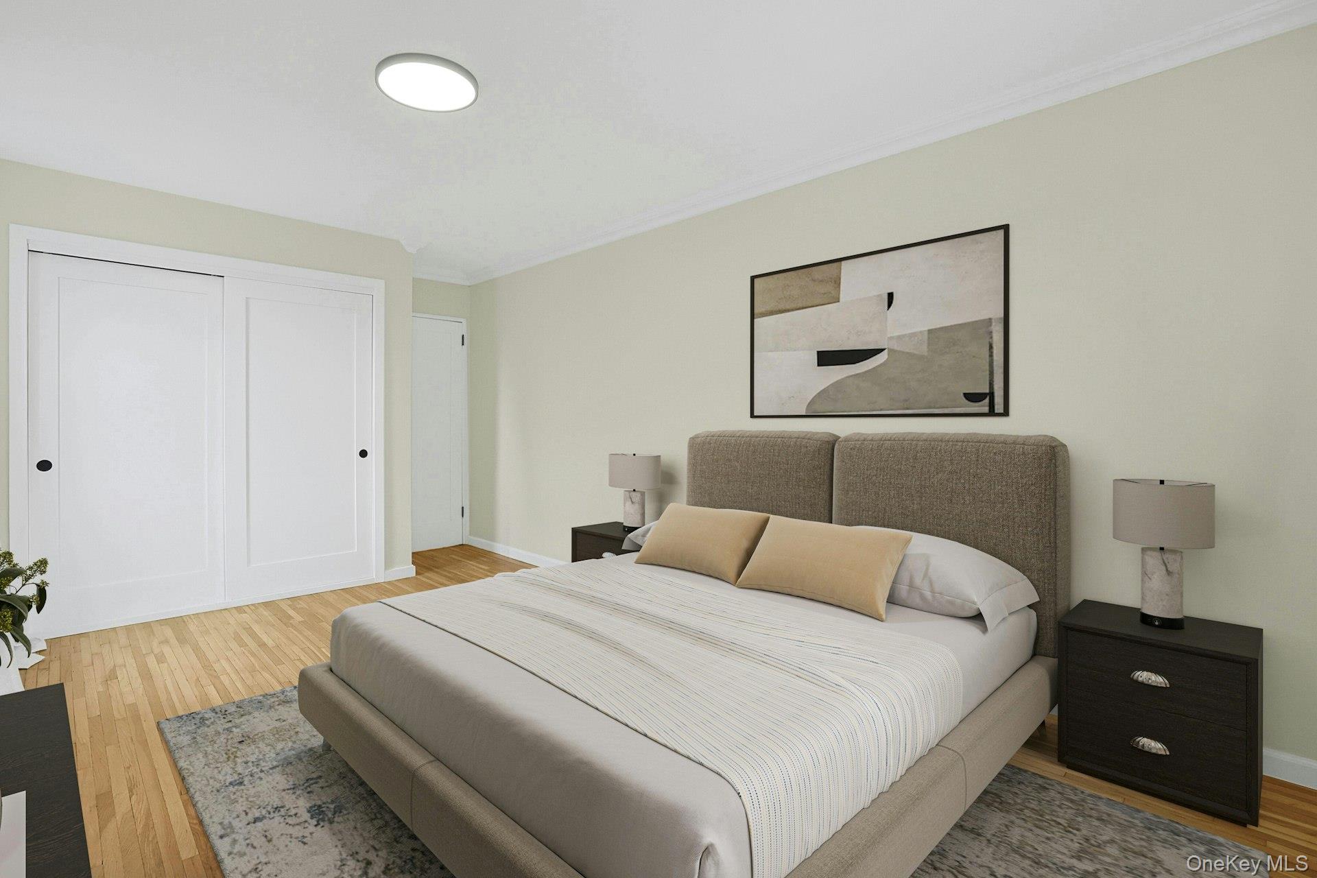 3363 Sedgwick Avenue, Unit 4D Bronx, NY 10463 - Photo 18 of 23 a bedroom with a bed and a night stand