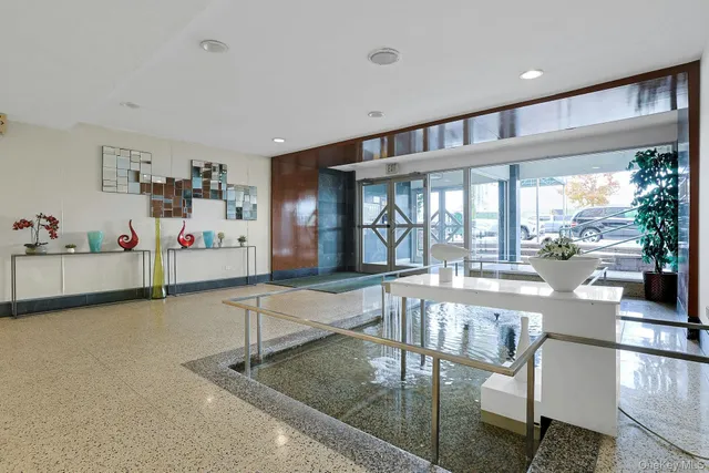 a room with lots of table chair