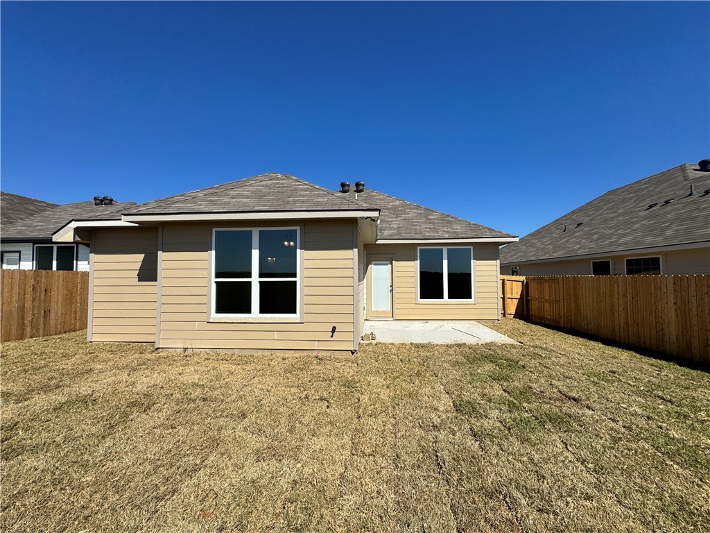 2425 Rooke Road Bryan, TX 77807 - Photo 9 of 10 a front view of a house with a yard