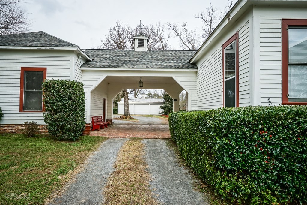 2627 Collier Road, Unit B1 Forsyth, GA 31029 - Photo 22 of 24 a front view of a house with a yard