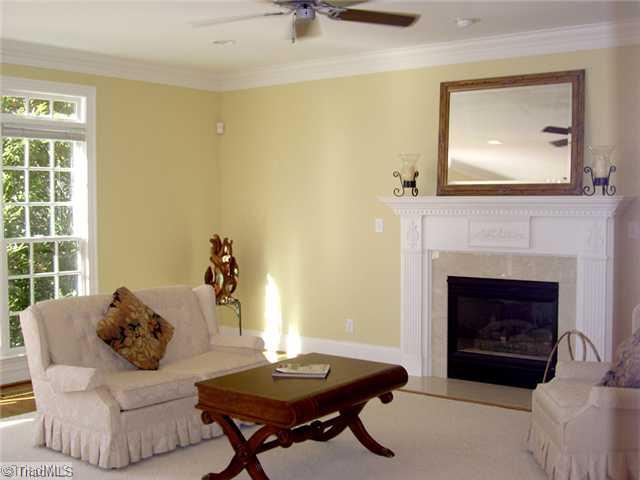 4006 Rockingham Road South Greensboro, NC 27407 - Photo 16 of 16 Den/Family/Great Room. Den/family room has hardwood floors, windows across the back that overlook a large wooded backyard. This room is open to the kitchen and large deck. As you can see the floor plan has a great flow!!