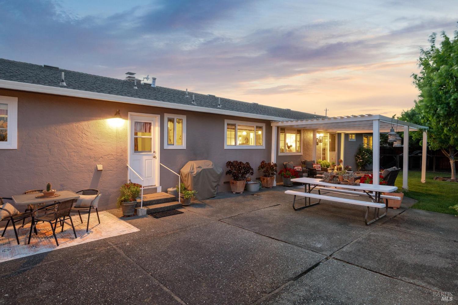 23180 Maffei Road Sonoma, CA 95476 - Photo 6 of 61 Sunset dining in your back yard which is fenced for pets and children.