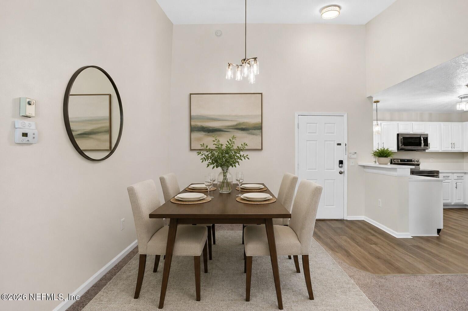7920 Merrill Road, Unit 615 Jacksonville, FL 32277 - Photo 12 of 26 Virtualy Staged Dining Area