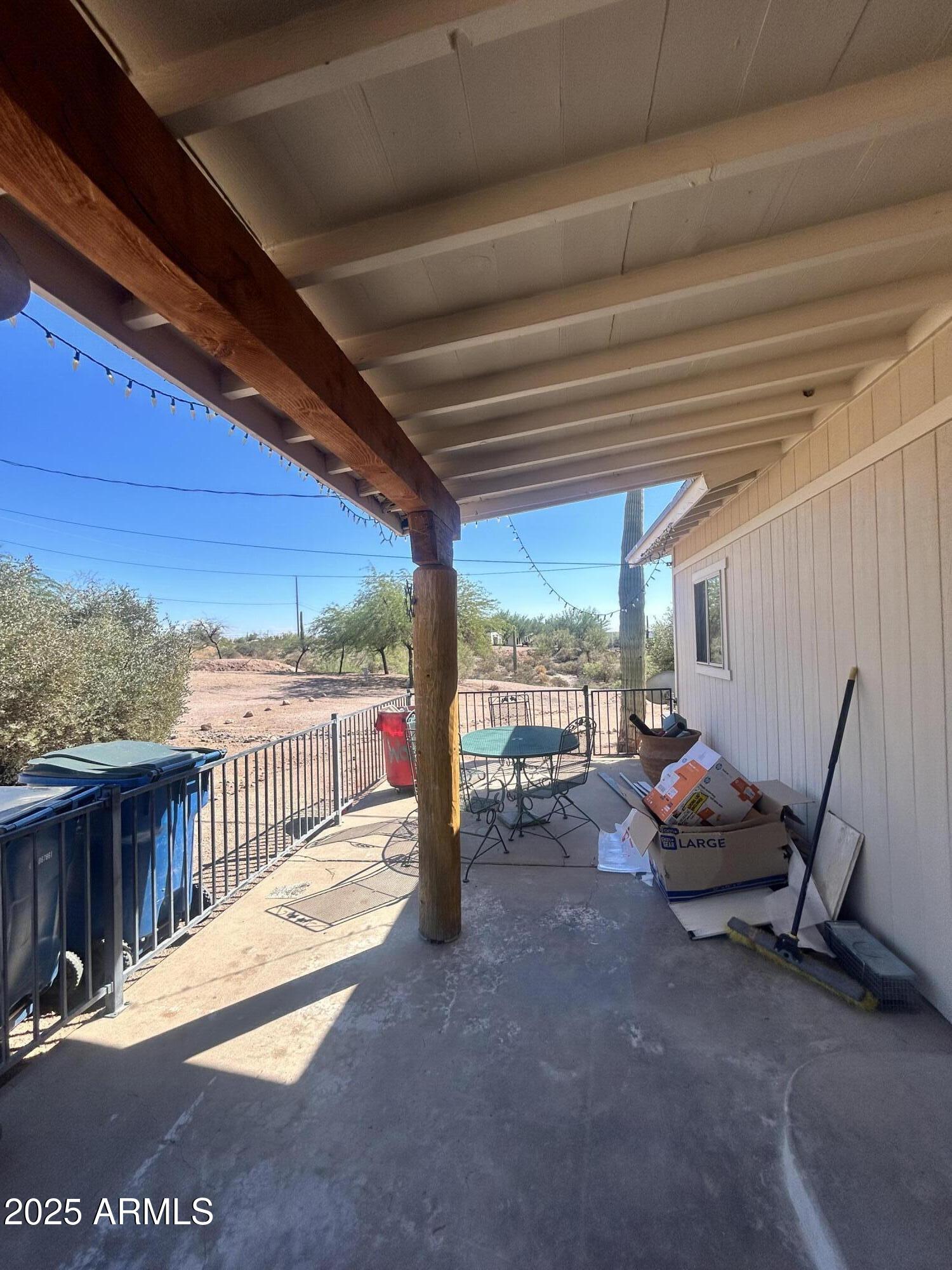 2950 North Val Vista Road Apache Junction, AZ 85119 - Photo 19 of 30 a view of a room with wooden floor and outdoor seating