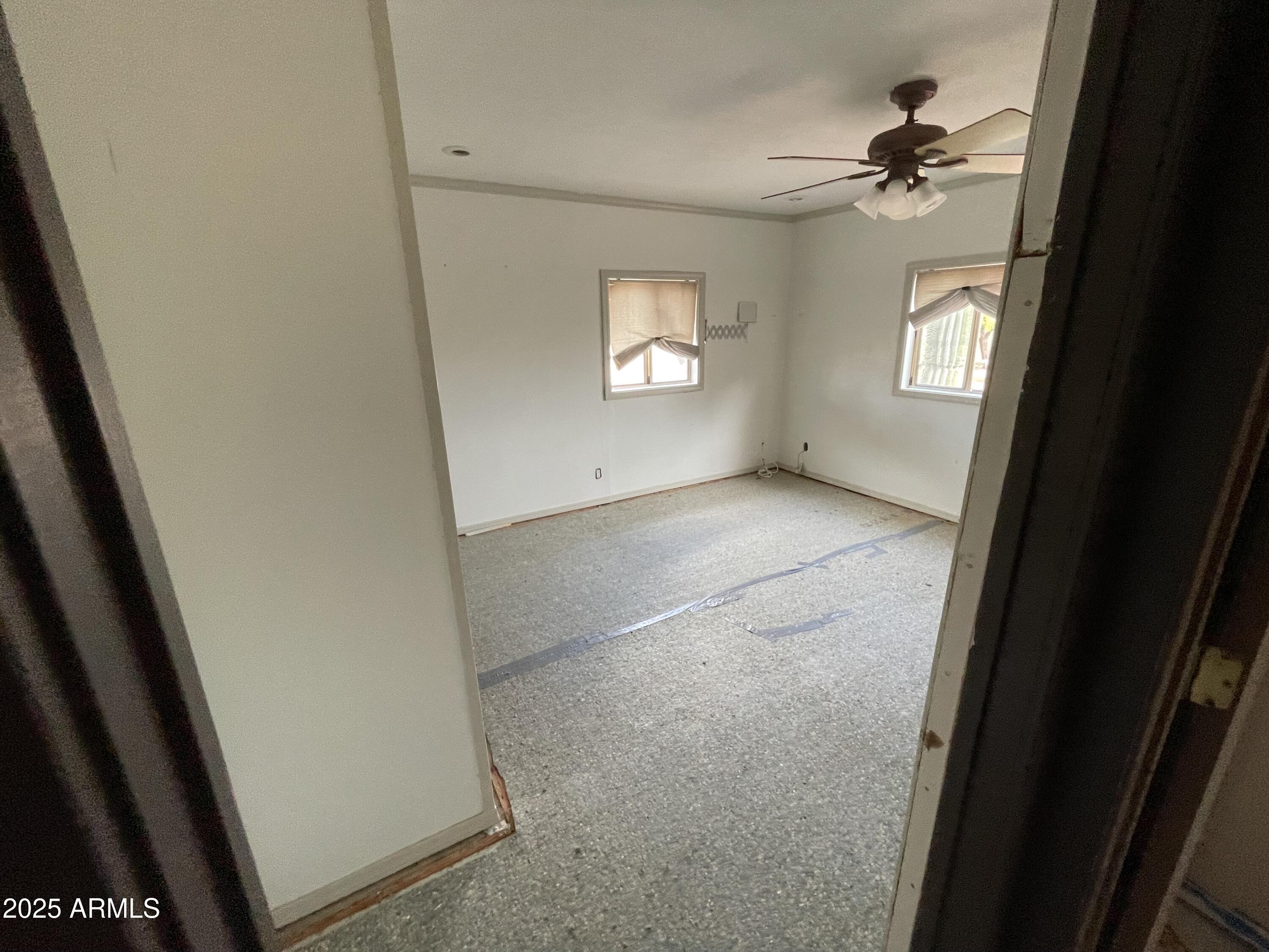 2950 North Val Vista Road Apache Junction, AZ 85119 - Photo 28 of 30 a view of an empty room with a window