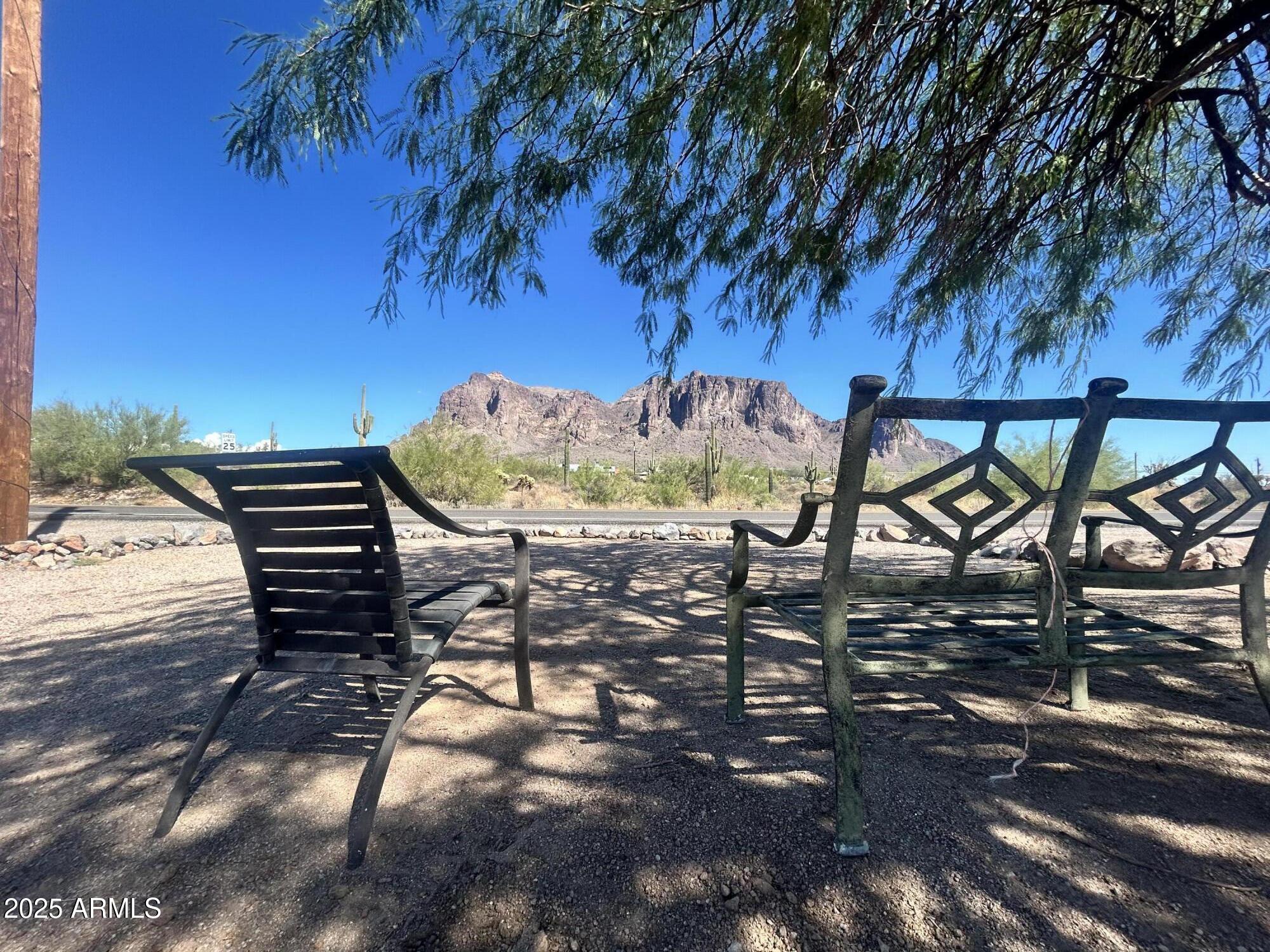 2950 North Val Vista Road Apache Junction, AZ 85119 - Photo 7 of 30 a view of a chairs and table in the patio
