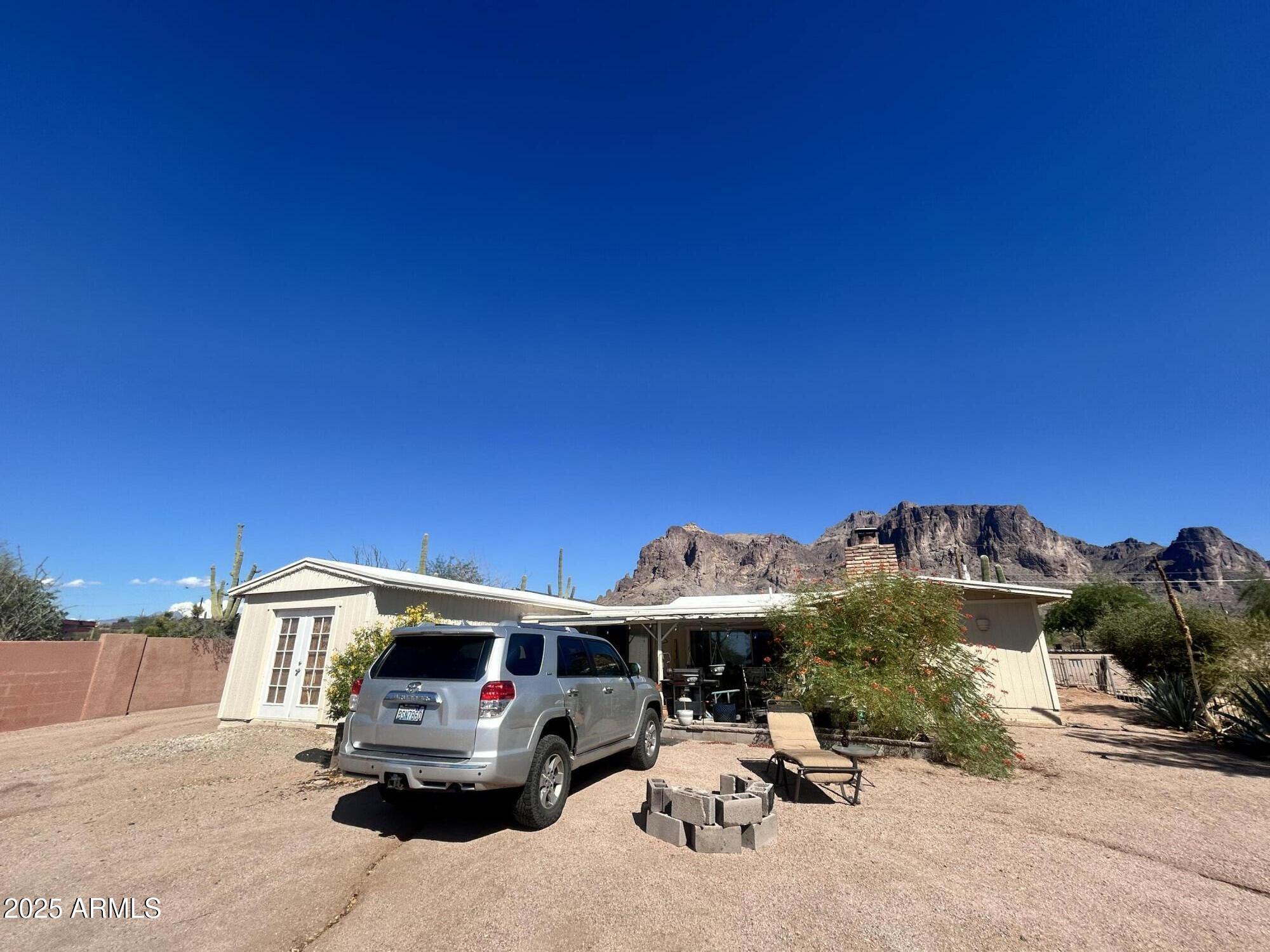 2950 North Val Vista Road Apache Junction, AZ 85119 - Photo 8 of 30 a view of a cars park in front of house