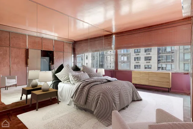 a bedroom with a large bed and a balcony view