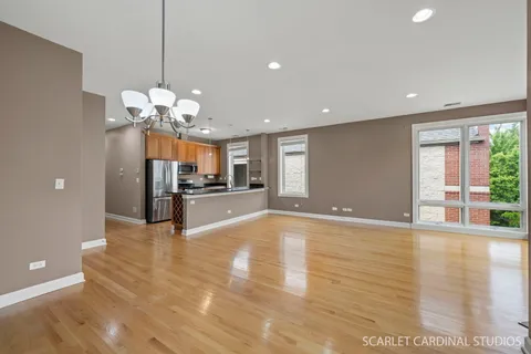 a view of a livingroom with a kitchen