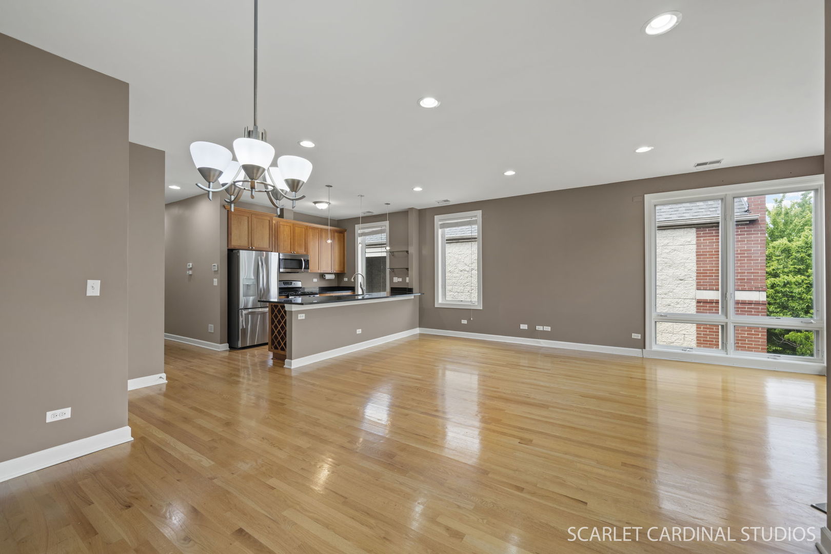 1419 West Fillmore Street, Unit 3W Chicago, IL 60607 - Photo 8 of 26 a view of a livingroom with a kitchen