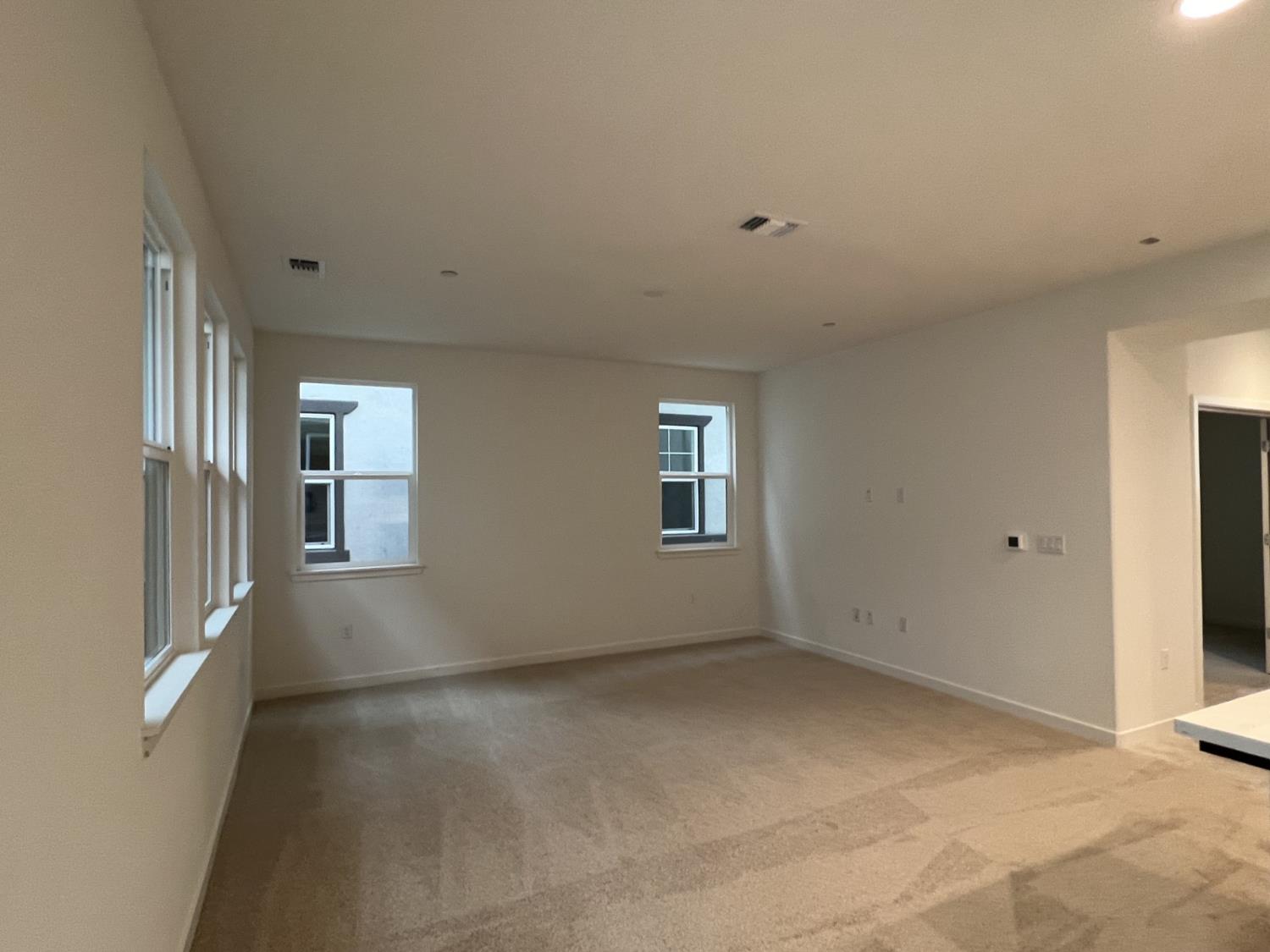 2628 Night Bloom Way Lathrop, CA 95330 - Photo 3 of 5 a view of empty room with windows