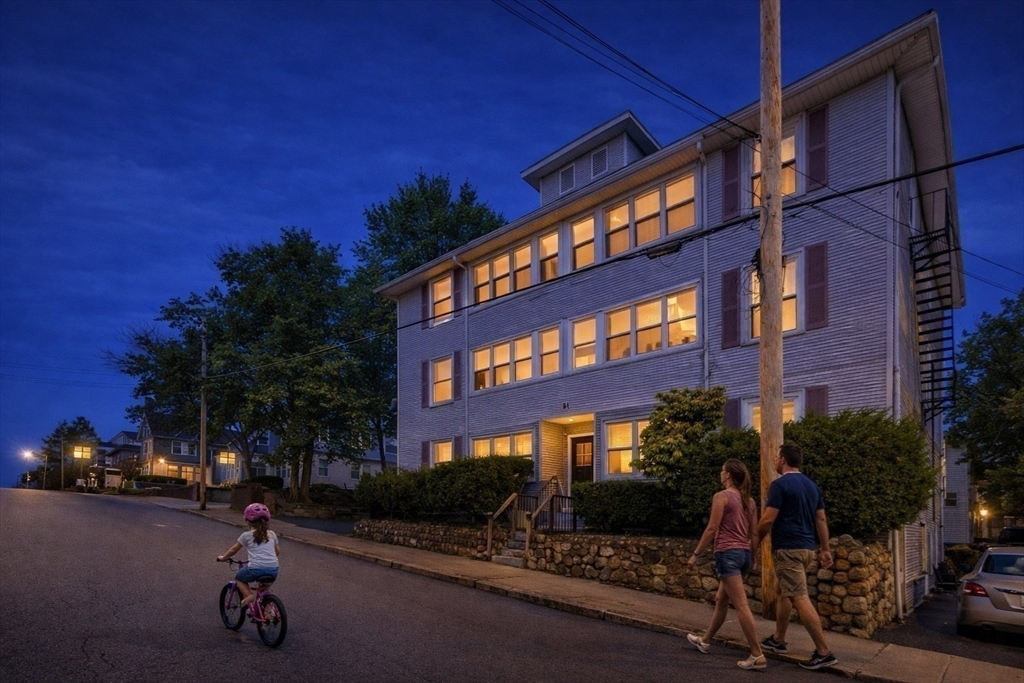 51 Wood Avenue Woonsocket, RI 02895 - Photo 13 of 14 a view of a street with a building in the background