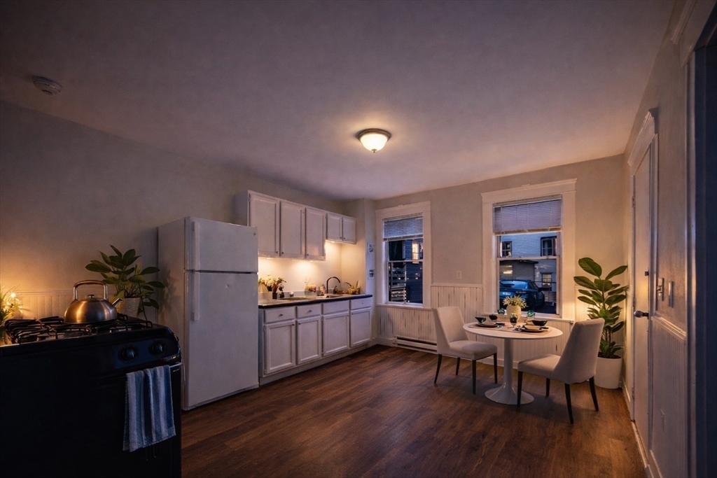 51 Wood Avenue Woonsocket, RI 02895 - Photo 6 of 14 a living room with furniture and a table
