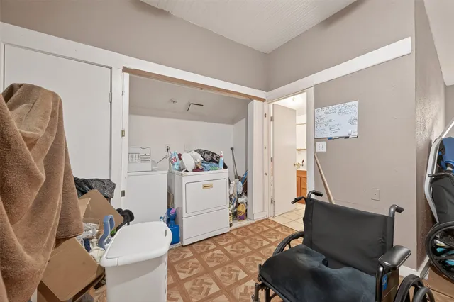 a room with a couch and a window