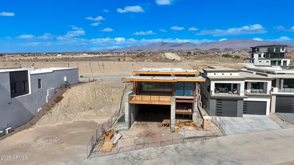 a view of a balcony with wooden floor and city view